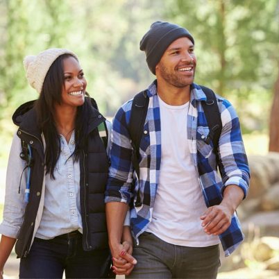 couple hiking through the Green Mountains