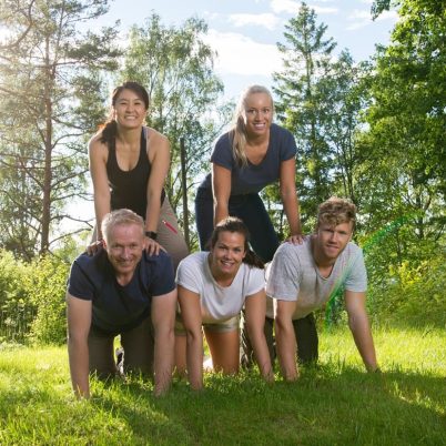 business group in pyramid on retreat in Vermont