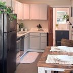A full kitchen and bar height dining table for two in the Riverside studio at Warren Lodge in VT